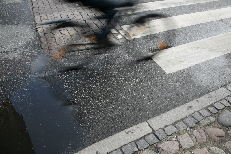 Q-Free electronic bicycle-activated warning signs Glasgow HI-TRAC CMU piezo-electric sensors