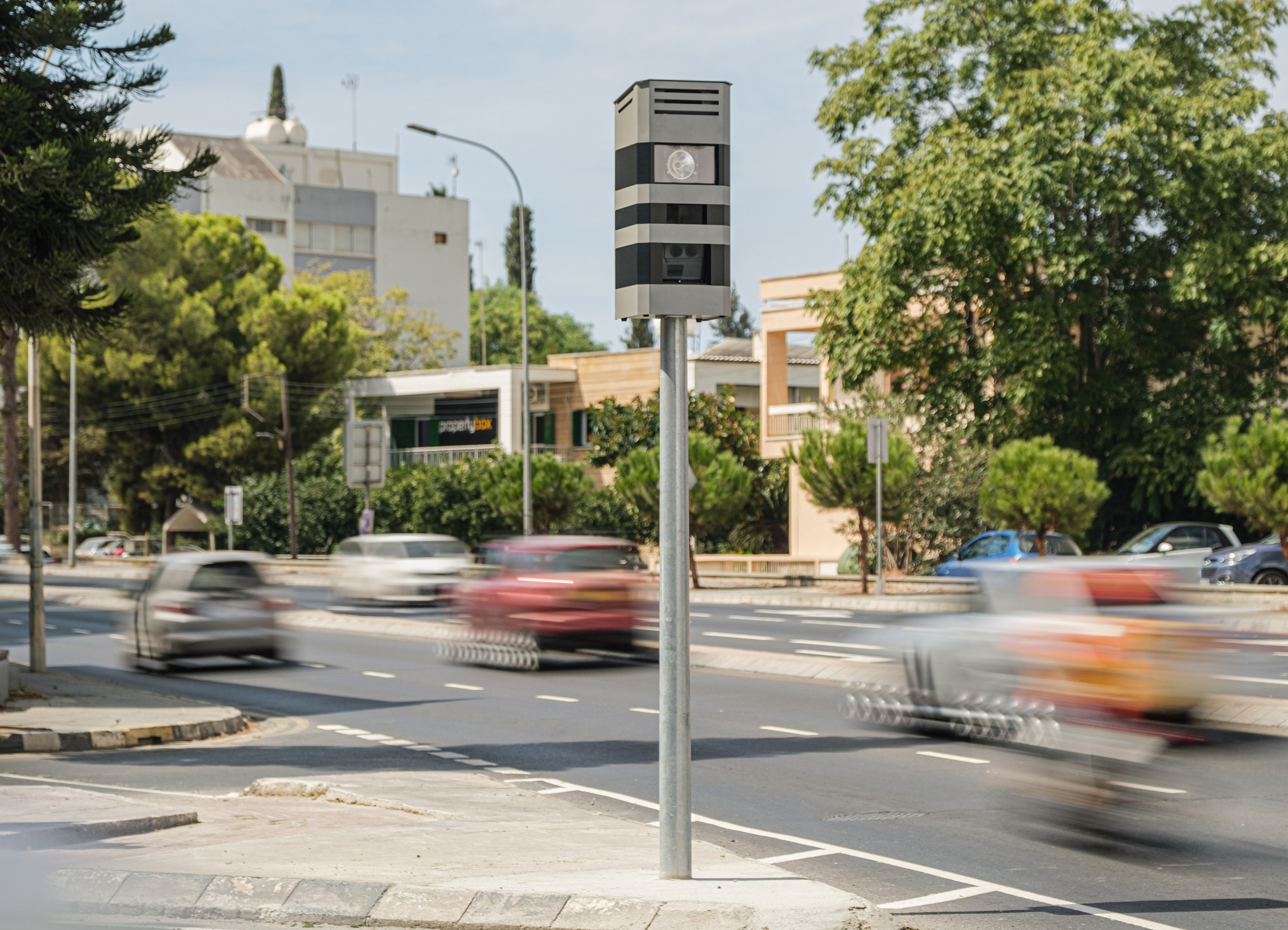 Automated traffic alert systems red-light running road safety (credit: Conduent)