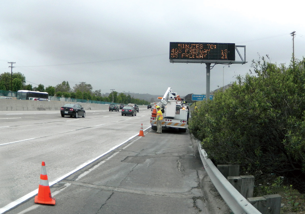 staff working adjacent to live traffic