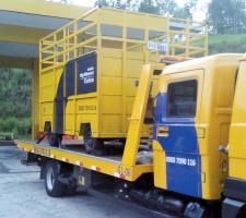 multipurpose truck and three mini loader shovels