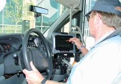 CnR driver with tablet at a stop