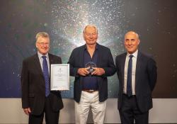 Brian Negus, ITS Australia ambassador and chairman, CICA Group (left) and Dean Zabrieszach, president, ITS Australia (right) present Dr Peter Sweatman (centre) with the 2020 Max Lay Lifetime Achievement Award (Credit: ITS Australia)