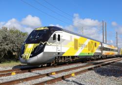 Iomob Brightline Trains journey planning multimodal door to door transport e-scooters ride-share on-demand shuttles