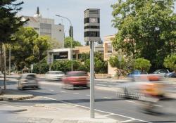 Automated traffic alert systems red-light running road safety (credit: Conduent)