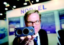 Jukka Pahkala of Noptel  displays the laser radars