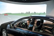 President Obama tries a V2I driving simulator