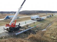 concrete pole being fitted