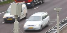 Grey speed cameras, on road 