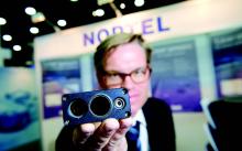 Jukka Pahkala of Noptel  displays the laser radars